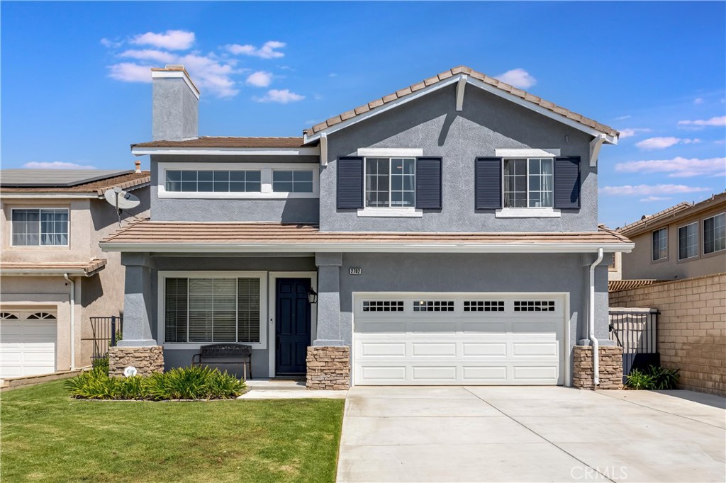 Discover this two-story, freshly updated 4-bedroom, 2.5-bath home on a quiet residential street in one of Simi Valley’s most beautifully maintained communities. This house blends contemporary flair with tradition and comfort, inside and out. Great curb appeal with a lush lawn, stacked stone pillars, and decorative shutters. The covered front porch is a perfect spot to enjoy the neighborhood and set the stage to welcome you into a striking formal living room with a statement brick fireplace and soaring two-story ceilings. Thoughtful touches like recessed lighting, crown molding, elegant flooring, and abundant natural light add warmth and style throughout the home. A wide passthrough and archway leads to an open-concept great room blending informal living, dining, and kitchen areas seamlessly, creating the perfect space for entertaining or just relaxing at home, with custom built-ins, versatile layout, and a sliding glass door leading to the backyard. The remodeled kitchen shines with abundant counter space, granite countertops, tumbled stone tile backsplash, contemporary cabinetry, stainless appliances, and a convenient center island. Upstairs, a large, adaptable loft overlooks the living room and is ideal for a home office, playroom, or media lounge or could be converted into a fourth bedroom. The spacious primary suite boasts a distinctive coved ceiling, walk-in closet, and luxuriously updated en-suite bath with dual sink, black quartz vanity, and a spa-inspired oversized shower and multiple shower heads. Two additional, good-sized bedrooms share a beautifully updated, full, hall bath with modern finishes. Additional features included a dedicated laundry area, EV charging capabilities, and an attached 2-car garage with direct access and storage space. Outside, the backyard is your private escape with a wide, covered patio, offering ceiling fans to keep cool, a built-in BBQ area, sparkling pool with brick coping, a diving board, and tranquil waterfall feature, all framed by a landscaped hillside, the ideal spot for summer gatherings or soaking in the sun. Wonderfully situated near parks, schools, shopping, dining, a golf course, and easy freeway access, this move-in ready this home is as functional as it is stylish, offering the best of comfort, design, and lifestyle. Don’t let this one pass you by!