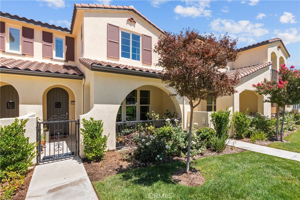 Welcome to 28727 Calle De La Paz Dr, Valencia, CA 91354 — a 2 bedroom, 2.5 bathroom, 1,264 SF townhome located in one of the most desirable communities in the Santa Clarita Valley. This spacious and well-maintained residence offers the perfect blend of comfort, style, and convenience, making it an excellent choice for families or anyone seeking low-maintenance living in a highly sought-after school district.
From the moment you arrive, you'll appreciate the privacy of the inviting front porch and the picturesque setting overlooking a large, grassy quad area — ideal for kids to play or enjoying a peaceful evening stroll. Inside, the floor plan is filled with natural light and thoughtfully upgraded throughout. The main living space flows effortlessly into the dining area and upgraded kitchen, complete with modern finishes and ample cabinetry for storage.
Upstairs, you'll find two oversized bedrooms including a generous primary suite featuring dual sinks, a walk-in closet, and a spacious ensuite bathroom. The secondary bedroom is equally large, offering comfort and flexibility for a growing family, home office, or guest room. An upstairs laundry area and LOFT adds convenience, while a 2-car attached garage provides direct access and plenty of room for storage.
This home is situated in a walkable neighborhood close to award-winning schools, shops, dining, and parks, making it easy to enjoy the best of Valencia living. With community amenities and tree-lined paths, this townhome combines location, space, and upgrades in one charming package. Don't miss your chance to make this exceptional property your own.