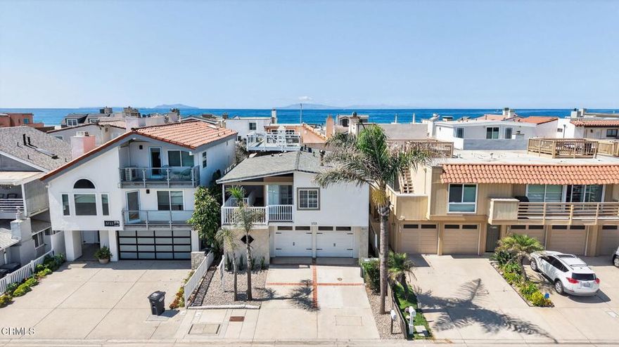 &#127796; Beach House with LEGAL ADU - Discover Your Dream Home in Hollywood Beach! &#127796;Welcome to this exceptional coastal retreat with breathtaking ocean views and an unbeatable location--just steps from the sand and a short stroll to the harbor for all your boating adventures.The first floor features a legal ADU, perfect for guests or generating rental income. This inviting space includes a cozy living area, full bedroom, and bathroom. Gorgeous wood flooring and a warm gas fireplace create a welcoming atmosphere. The kitchenette is outfitted with a wet bar, 805 kegerator, sink, refrigerator, elegant cabinetry, natural wood beams, and a built-in breakfast bar. Sliding glass doors lead to a private outdoor oasis with a rock fireplace and BBQ--ideal for family dinners and entertaining.On the second floor, you'll find two additional bedrooms and two bathrooms. Vaulted open-beam ceilings, wood flooring, and another fireplace add warmth and character. A spacious front deck invites you to relax and soak in the views. The kitchen showcases custom cabinetry, quartz countertops, and tile flooring, plus a convenient office/desk area that makes working from home a breeze. The primary suite boasts generous closet space and a spa-inspired bathroom with soaking tub and dual-head shower.Head up to the rooftop deck to experience sweeping panoramic views and stunning sunsets. Whether entertaining friends or simply unwinding after a beach day, this is the perfect spot.Located within walking distance of local restaurants and the farmers market, this property is the ultimate beach lifestyle investment. Live in the main residence while enjoying income from the ADU--or create your own multi-generational retreat.Experience the beauty of Hollywood Beach, where every day feels like a vacation. Don't miss this rare opportunity to own a true slice of paradise!