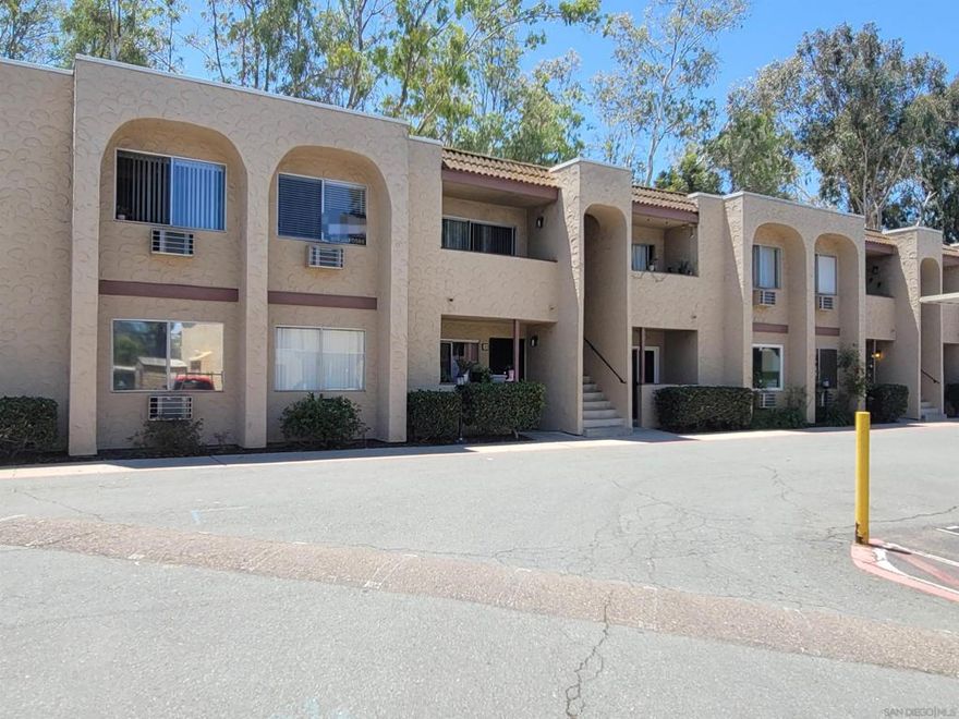 Welcome home to this freshly updated unit in a quiet, gated hillside community. Unit features new wood shaker cabinets and matched quartz counters in the kitchen and baths with a stainless appliance package including new range, microwave, and dishwasher. Large format ceiling-height tile in both baths with a high gloss finish for low maintenance, new water heater with increased capacity, and durable, waterproof vinyl plank tile throughout. Unit features a private balcony with peek views of Mt. Helix, covered assigned parking space right outside the front door plus a second uncovered space. Complex has large, modern laundry, pool, exercise room, gated access, and some of the lowest HOA fees in town. Freeway access, shopping, and dining all just a few blocks away, this property is a perfect starter home or turnkey investment!