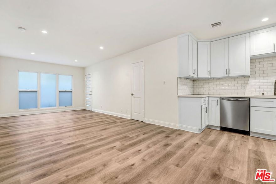 (LISTED AT $3,750/MONTH. NET EFFECTIVE RENT IS APPROXIMATELY $3,440/MONTH BASED ON A CONCESSION EQUIVALENT TO ONE MONTH FREE ON A 12-MONTH LEASE (SUBJECT TO APPROVED CREDIT). SECURITY DEPOSIT IS $3,750.) Welcome to 337 N Oakhurst Dr #1, a beautifully reimagined 1-bedroom, 1-bath residence located in one of the most desirable pockets of Beverly Hills Proper. Step inside to an open-concept living area with wide-plank flooring, in unit laundry, recessed lighting, and sleek modern finishes throughout. The newly remodeled kitchen features white shaker cabinetry, quartz countertops, subway tile backsplash, and stainless steel appliances. A spacious bedroom with mirrored closets and an elegant designer bathroom complete the home's bright and airy layout. Enjoy the best of Beverly Hills living just moments from world-class dining, shops, and cafes along Robertson, Beverly, and Burton Way. Includes one assigned parking space.