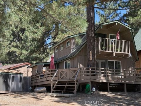 Photo of 33436 Bluebird Dr, Green Valley Lake, CA 92341 (MLS # IV26083477)