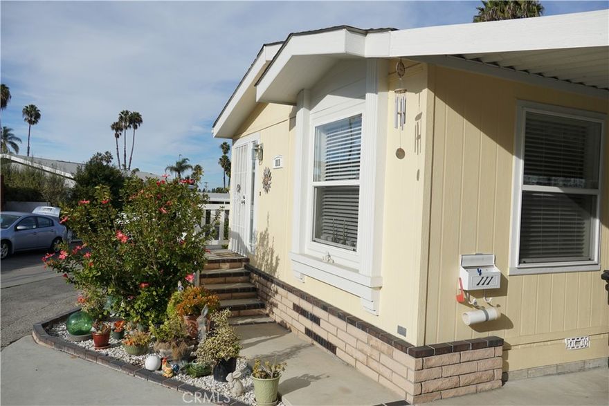Exquisite one of a kind manufactured on park at Skyline All ages Park. Nestled in South Torrance across from Rolling Hills Plaza great restaurants, and walking to distance to movie theatres, shops, and cafes.  Skyline offers a private gated entrance with a clubhouse, swimming pool,  and dog park.  The Unit has a lovely and tranquil location and it is one of the newest in the park. 980 square feet of cozy living space, a traditional kitchen with Oak cabinets, gas stove, oven refrigerator, and dishwasher. The front is adorned with a well maintained garden and steps to the front entrance with a small porch. This place will be your perfect retreat at the South Bay and a place you'll call home.