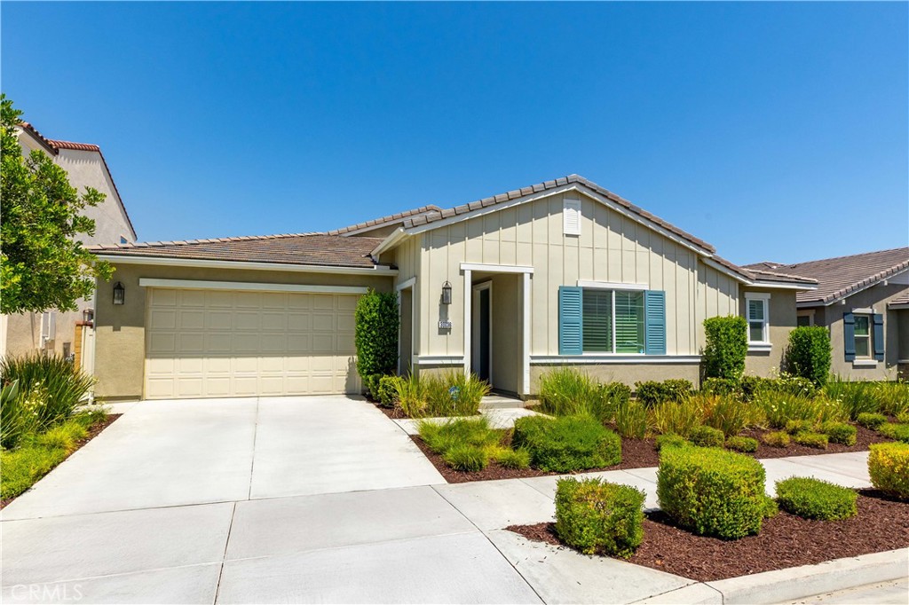 Rarely available! Discover this stunning 2020-built, single-story multi-generational home in Audie Murphy Ranch. Take advantage of a 2.99% VA assumable loan for qualified buyers! Boasting 2,881 sq ft with 4 bedrooms and 3.5 baths, this home features a private Multi-Gen Suite with a separate entrance, kitchenette, en-suite bath, and laundry hookups – perfect for extended family or a dedicated home office. Enjoy an open-concept great room with a gourmet kitchen, large island, stainless steel appliances, granite counters, and a walk-in pantry. The primary suite offers privacy, a luxurious en-suite, and a huge walk-in closet. Upgraded luxury vinyl plank flooring, plantation shutters, and a spacious utility room elevate the interior.Outside, relax in the California Room, or enjoy the low-maintenance backyard with artificial turf and stylish hardscaping. A 3-car tandem garage with epoxy flooring and a leased Tesla solar panel system complete this exceptional property. Audie Murphy Ranch offers incredible amenities, including resort-style pools, a clubhouse, sports park, and a vibrant community calendar. Don't miss your chance to own a nearly new home in this sought-after, sold-out community!