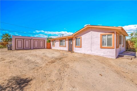 Photo of 6414 Mariposa Avenue, 29 Palms, CA 92277 (MLS # JT25231768)