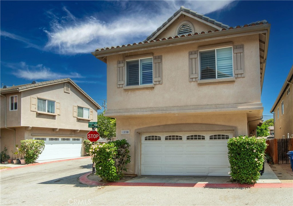 Tucked away in the serene, inviting enclave of Cambria Village, this stunning townhome offers three bedrooms and three bathroom and over 1782 square feet, the perfect blend of comfort, elegance, and modern convenience. From the moment you enter, you're welcomed into a light-filled living space where soaring ceilings, fresh finishes, and tasteful design elements create a warm and inviting atmosphere. The open-concept layout flows effortlessly from the spacious living area to a well-appointed kitchen, ideal for both everyday living and entertaining. Upstairs, generous bedrooms provide peaceful retreats, while the primary suite impresses with its private bath and ample closet space. Outside, a private patio invites you to relax or dine al fresco, surrounded by the tranquil ambiance of this well-maintained community. The unit also has a two car garage and Tesla charger included. With amenities like a sparkling pool, manicured grounds, and secure access, Cambria Village offers a lifestyle of ease and charm in the heart of Sylmar. This is more than just a home—it’s a sanctuary where comfort meets style, and every detail has been thoughtfully crafted to elevate your everyday. Low HOA fee, the property is a must!