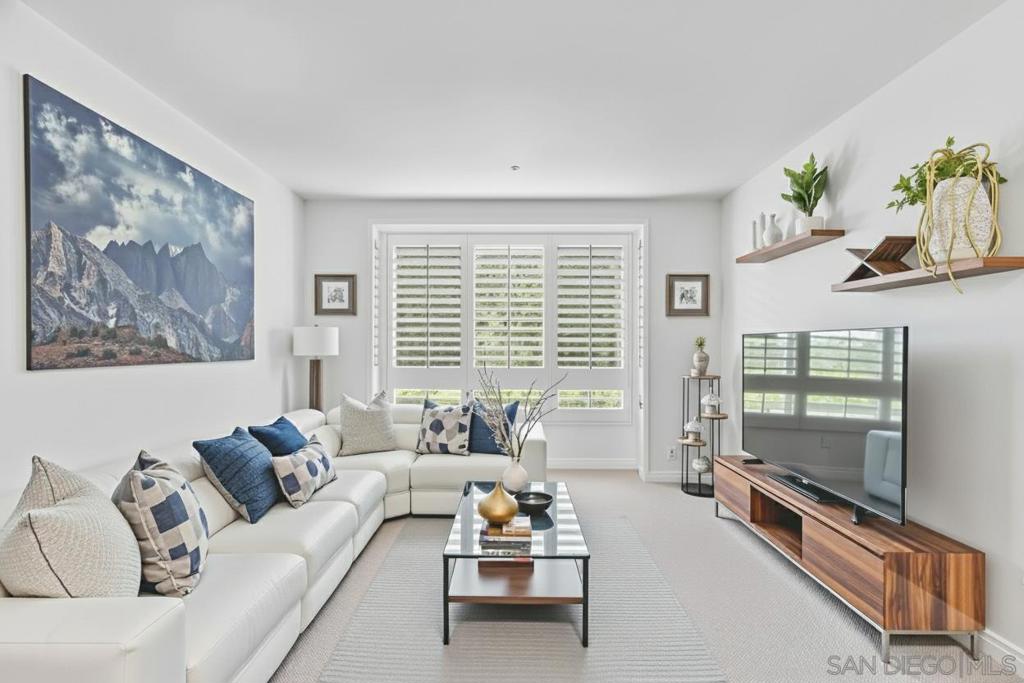 Beautifully remodeled, spacious condo with a highly desirable split floor plan that ensures privacy and versatility—perfect for accommodating roommates, hosting guests or creating a dedicated home office. The brand-new gourmet kitchen features Classic Calacatta quartz countertops, a Kohler farmhouse sink and KitchenAid stainless steel appliances. The open-concept living area is large and inviting, enhanced by plantation shutters and new LED lighting throughout. Both bathrooms have been stylishly renovated, and new plush carpeting adds warmth and comfort throughout the bedrooms. Stay cool year-round with the new 2-ton HVAC system and Nest thermostat, offering modern energy efficiency. This condo offers ample storage with multiple closets and cabinets including two large walk-in closets adjacent to the bedrooms. With premium upgrades, a functional layout, and a truly move-in-ready finish, this home is a fantastic opportunity for investors, first-time home buyers, or anyone looking for a spacious, move-in-ready home. Union Square Condominiums deliver exceptional value with below-average HOA fees. Amenities include a fitness center, pool, sauna, clubhouse with a pool table, and courtyards with BBQs. The HOA also covers key utilities such as water and trash, adding even more value for homeowners. An on-site property manager ensures smooth day-to-day operations, while multiple communal EV charging stations make powering your electric vehicle easy. With a Walk Score of over 90, this property is ideally located steps from San Diego City College with convenient access to major freeways: 163, 5, and 94. Adding to the neighborhood’s safety and peace of mind, the San Diego Police Department (SDPD) headquarters is located directly across the street. Also just a block away, a new major development "Makers Quarter" is coming soon to the neighborhood.The project spans five city blocks and will feature open green spaces, retail, cafes, beautiful gardens and art installations; a wonderful addition to the area!