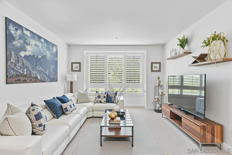 Beautifully remodeled, spacious condo with a highly desirable split floor plan that ensures privacy and versatility—perfect for accommodating roommates, hosting guests or creating a dedicated home office. The brand-new gourmet kitchen features Classic Calacatta quartz countertops, a Kohler farmhouse sink and KitchenAid stainless steel appliances. The open-concept living area is large and inviting, enhanced by plantation shutters and new LED lighting throughout. Both bathrooms have been stylishly renovated, and new plush carpeting adds warmth and comfort throughout the bedrooms. Stay cool year-round with the new 2-ton HVAC system and Nest thermostat, offering modern energy efficiency. This condo offers ample storage with multiple closets and cabinets including two large walk-in closets adjacent to the bedrooms.  With premium upgrades, a functional layout, and a truly move-in-ready finish, this home is a fantastic opportunity for investors, first-time home buyers, or anyone looking for a spacious, move-in-ready home.  Union Square Condominiums deliver exceptional value with below-average HOA fees. Amenities include a fitness center, pool, sauna, clubhouse with a pool table, and courtyards with BBQs. The HOA also covers key utilities such as water and trash, adding even more value for homeowners. An on-site property manager ensures smooth day-to-day operations, while multiple communal EV charging stations make powering your electric vehicle easy.   With a Walk Score of over 90, this property is ideally located steps from San Diego City College with convenient access to major freeways: 163, 5, and 94. Adding to the neighborhood’s safety and peace of mind, the San Diego Police Department (SDPD) headquarters is located directly across the street.   Also just a block away, a new major development "Makers Quarter" is coming soon to the neighborhood.The project spans five city blocks and will feature open green spaces, retail, cafes, beautiful gardens and art installations; a wonderful addition to the area!
