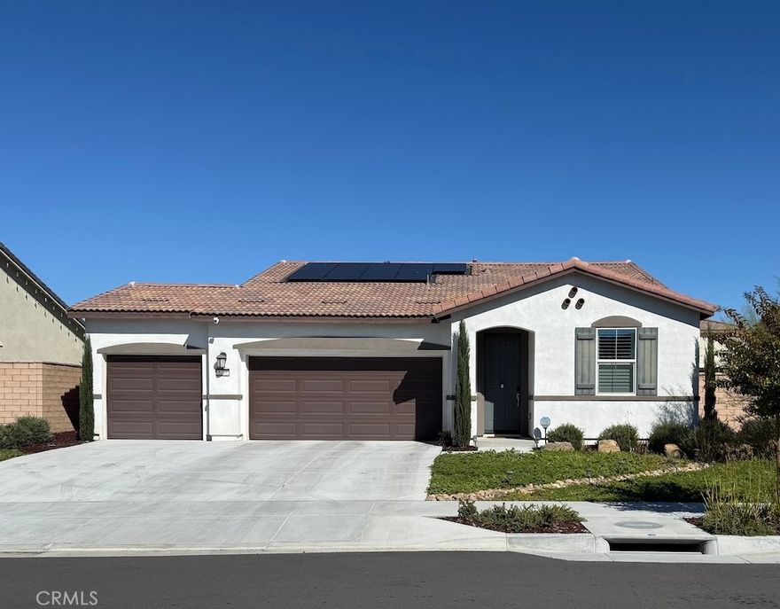 Welcome to your new home in the beautiful Saddle Point community. Built in 2023, this beautiful single-story residence offers 3 spacious bedrooms and 2 full bathrooms and a three-car garage.  Upon arrival, you’ll be greeted by a lovely drought tolerant landscape that will add to your curb appeal. Once you step inside, discover an open floor plan filled with natural light, featuring a large living area that flows into the modern kitchen. Each bedroom is nice sized, providing comfort and flexibility for the whole family. The backyard is ready for entertainment, complete with concrete patio, low-maintenance mulch landscaping, and a lovely patio cover for relaxing or hosting. Your new home is located near local shopping, schools, and parks. This home features a whole house ring alarm system with four cameras. In addition, this home is EV ready with charging station in garage. This home is priced to sell, schedule your showing now, while it lasts.