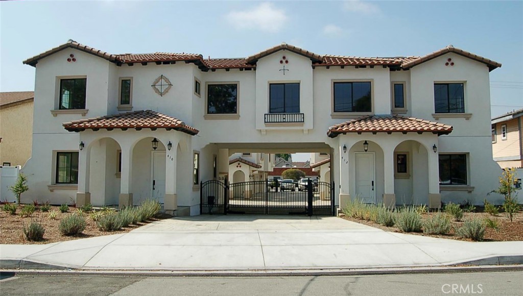 Now Available for Lease! Welcome to this stunning, newly built 3-story end-unit townhome located in an exclusive gated complex of just 6 homes in desirable Monrovia. Designed in a charming Mediterranean style, these units are located in an attractive complex offering enhanced privacy, gated and in a prime location, close to shops, dining, and transportation. The entry level features a welcoming foyer, a versatile den—perfect for a home office or guest room—a full bathroom, and direct access to a private patio, ideal for outdoor relaxation. On the second level, enjoy a spacious and light-filled living room with designer plank flooring, recessed lighting, and multiple windows. The contemporary kitchen is a chef’s dream, showcasing sleek quartz countertops, crisp white cabinetry, and state-of-the-art stainless steel appliances. This level also includes a bedroom with en-suite bath and an additional half bathroom for guests. The third level features two more generous bedrooms and a stylish full bath with a double sink vanity. Don’t miss your opportunity to lease this beautiful and thoughtfully designed home.