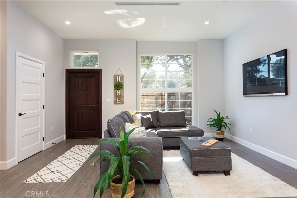Spacious townhouse within the Royal Oaks a stunning architecturally-designed community of 6 townhouses located in the heart of Thousand Oaks and minutes from the Westlake Village Promenade. The thoughtfully designed home features over 1,800 sqft, a large open floor plan, 3 spacious bedrooms, 2.5 bathrooms, a private patio and balconies, an office space, high ceilings, and a direct two car garage. Between the natural light radiating through the large ample windows and skylights to the high end custom finishes throughout, this home is move in ready. Please note, entire interior has been updated with a new white paint. This townhouse is in a great location and proximity to the finest restaurants and shopping!