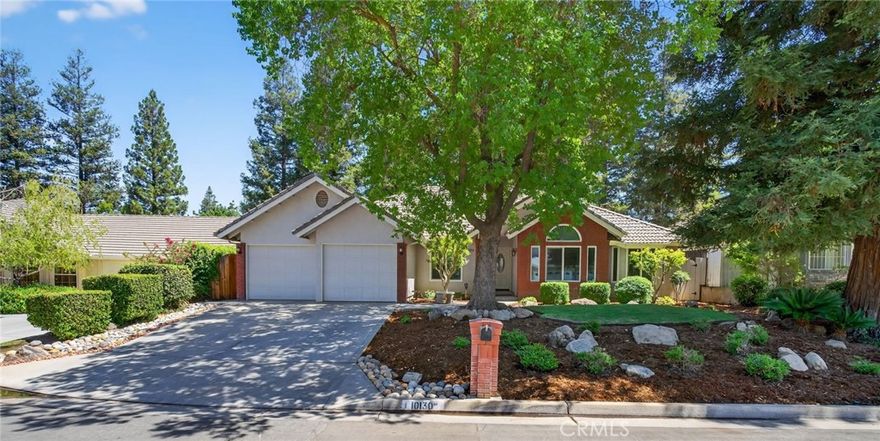 Located in a quiet cul-de-sac in the prestigious Fort Washington area, this beautifully updated home is just one block from Fort Washington Country Club. The HOA community offers 24/7 security patrol, maintained landscaping, and neighborhood standards for only $560 annually. The home features a tile roof, brick façade, durable exterior coating, and professional landscaping. Major upgrades include a full-house repipe, whole-house water filter and softener, dual Rinnai tankless water heaters, triple-pane windows (except under the covered patio), an insulated attic, and a wraparound covered patio ideal for entertaining. A monitored ADS security system is also included. Inside, each room offers thoughtful custom design. Highlights include a living room with beam ceilings, skylight, and designer lighting; a remodeled kitchen with granite counters, lighted cabinets, and KitchenAid appliances; and a dining area with unique ceiling detail. The primary suite features open beam ceilings and a remodeled bath with granite and skylight. Additional bedrooms offer custom lighting, ceilings, and architectural accents. This is a rare opportunity in one of Fresno’s most desirable neighborhoods.