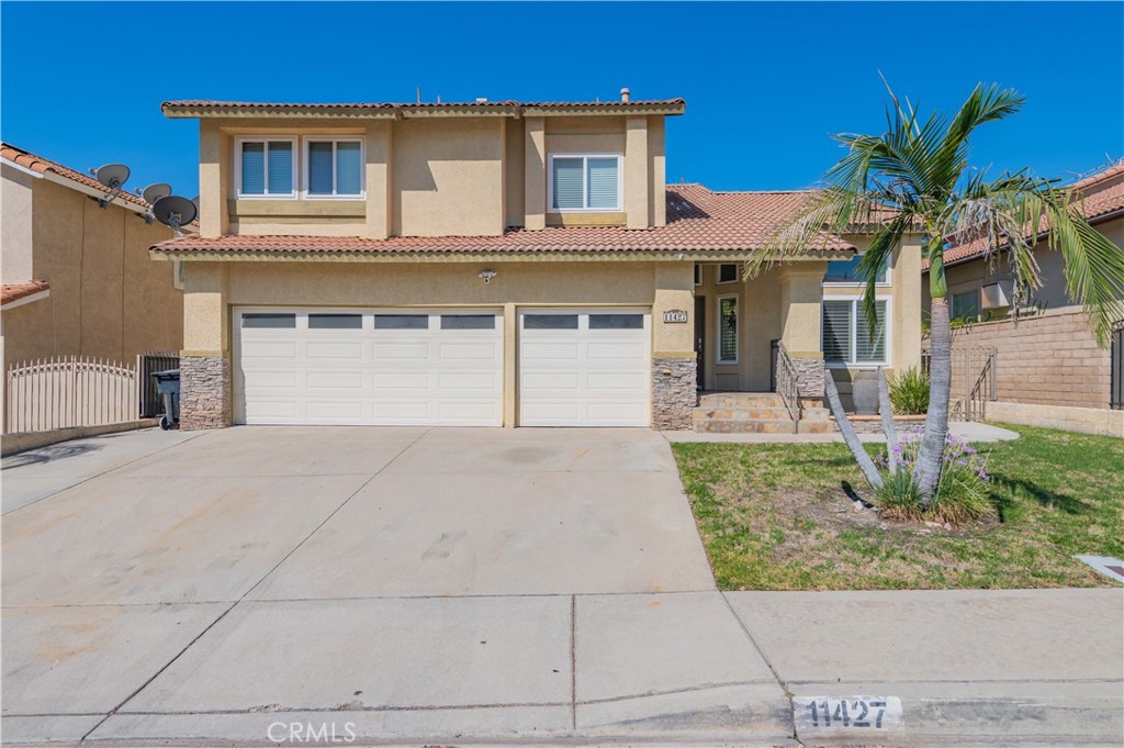 Gorgeous house located in a desirable neighborhood, close to Kenyon Way Park. This beautifully updated property with the spacious layout features vaulted ceilings, a formal living and dining room combo, and a circular floor plan that flows into a tasteful kitchen with refinished cabinets, granite countertops. The kitchen has a breakfast nook, opens to a cozy family room with a brick fireplace: ideal for gatherings and entertaining. Upstairs, you'll find four generously sized bedrooms with vaulted ceilings, including a spacious master bedroom with a soaking tub, separate shower, and dual vanities. The decent size backyard features one big covered patio and plenty of grassy space. The 3-car garage provides plenty of storage and workspace, with room for vehicles, tools, and equipment. Located in a top-rated school district, near Freeway 210, super markets, Victoria Gardens, Ontario Mills, and restaurants.