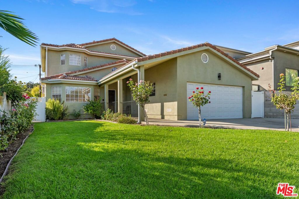 Welcome to 807 E Orange Grove, a beautifully touched-up 3-bedroom, 3-bathroom home offering nearly 2,900 sq ft of living space in the heart of Burbank. Just moments from Warner Bros. Studios, Walt Disney Studios, top shopping and dining, and located within the award-winning Burbank School District, this residence perfectly blends comfort, style, and convenience. Inside, refinished hardwood floors throughout create a warm, move-in ready atmosphere. The home features two spacious living areas perfect for everyday living or gathering with loved ones. Imagine cozy evenings by the fireplace during the holidays or enjoying movie nights with plenty of room to spread out. A formal dining room sets the stage for memorable dinner parties and hosting guests in style. Upstairs, the expansive primary suite is a true retreat, complete with a generous walk-in closet, spa-inspired bathroom, and private balcony with a refreshing view. Two additional bright, airy bedrooms with ample closet space provide comfort for family or guests. The outdoor spaces are equally inviting, with a covered patio ideal for entertaining, a BBQ for weekend cookouts, and a bonus enclosure for added storage and utility. A 2-car side-by-side garage with direct access and in-home laundry add to the everyday convenience. This home truly offers the space, function, and charm to live, work, and entertain with ease in one of Burbank's most desirable locations.