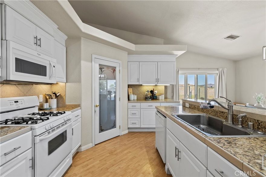 Welcome to this single-story 3 bedroom, 2 bathroom home tucked away in Lake Hughes-just 20 miles from Santa Clarita. With no rear neighbors and breathtaking mountain views right in your backyard. Step outside and find yourself immersed in the beauty of the mountains—it's like having your own private trail system right out the back door. Inside, you'll love the open layout that flows effortlessly from the spacious living area to the kitchen and dining space, making it ideal for entertaining or simply relaxing at home. The garage is just as impressive, featuring epoxy flooring and taller ceilings.

Whether you're sipping coffee on the patio or cozying up indoors, this home brings the outside in and lets you live the mountain lifestyle-without being too far from the city.