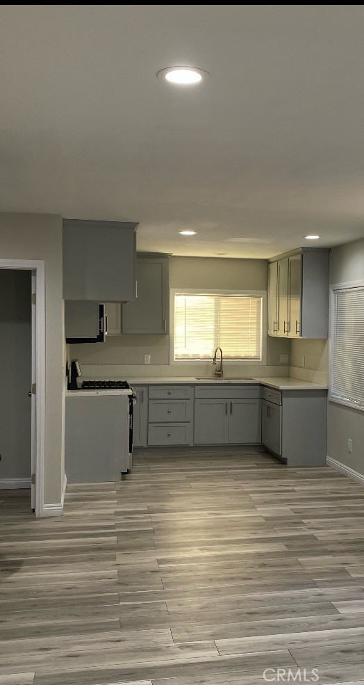 This stunning, newly remodeled 2-bedroom, 1-bathroom home blends modern elegance with everyday comfort. Downstairs unit., the residence offers a bright and airy open concept living area, enhanced by an abundance of natural light and stylish contemporary finishes. The fully renovated kitchen is a chef’s dream, complete with sleek stainless-steel appliances, sophisticated countertops, and ample cabinetry—perfect for both cooking and entertaining. This home is an ideal balance of design and functionality, ready to welcome you with a touch of luxury. Don't forget how much money you will save by having your own washer and dryer hookups. Property is centrally located close to freeway with alley access to your one car garage. Most important within walking distance to school and grocery stores, One car garage.