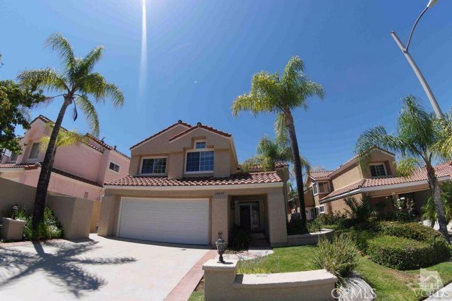 This beautiful home in Calabasas Hills is located in a private guard gated community. This home has been freshly painted top to bottom with newer carpet and travertine flooring. It has a large formal living room and dining area, an open family room with a marble lined fireplace, eat-in kitchen area and breakfast bar. Open kitchen with tile counters, double oven, gas range and newer dishwasher. Indoor laundry, 2 car garage, large master bedroom with high ceilings and a view, a walk-in closest and open master bathroom with a 2nd closest, dual sinks, large soaking tub and separate shower. There are two more bedrooms upstairs with high ceilings and a full bathroom with plenty of linen space. The rear yard is beautifully landscaped with a great view! There are 2 community pools & spas, a play area and located near shopping and award winning schools.