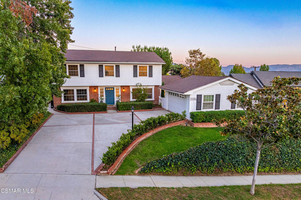 This timeless Colonial-style home is the one you've been waiting for! A true luxury home with modern touches.Nestled near the hills in Simi Valley's highly desirable Nob Hill neighborhood, it offers classic curb appeal with beautiful landscaping, mature trees, and brick accents with black window shutters. A staple of colonial design. Inside, tons of windows bring in a lot of natural light, complemented by recessed lighting and smooth-finished walls and ceilings. Step into the formal entry which leads to either the family room, or the office/den with double glass doors. If needed, that room could be used as a fifth bedroom.The kitchen is the centerpiece of this home. A true chef's kiss. Features in the kitchen include stainless steel Thermador smart appliances, an oversized island ideal for meal prep or entertaining, quartz countertops, porcelain tile backsplash, gold-accent hardware, and an abundant of soft-closing cabinets and drawers. Upstairs, all four bedrooms have been updated with wood-like flooring, recessed lighting, and upgraded sliding closet doors. The primary suite boasts a beautifully remodeled bathroom with dual shower heads and elegant stone finishes, and a walk-in closet area. The upstairs hall bathroom is just as nice with a remodeled shower and tub, updated vanity, and stone tile floors. Outdoors, enjoy evenings around the firepit, a large grassy area, and fruit trees including pomegranate and grape vines. Additional highlights include dual-pane windows, a whole-house fan, bidets on every toilet, a tankless water heater, a water filtration system, EV-capable charging in the garage, an approximately two-year-old ac unit, and NO HOA! Come see what luxury looks like!