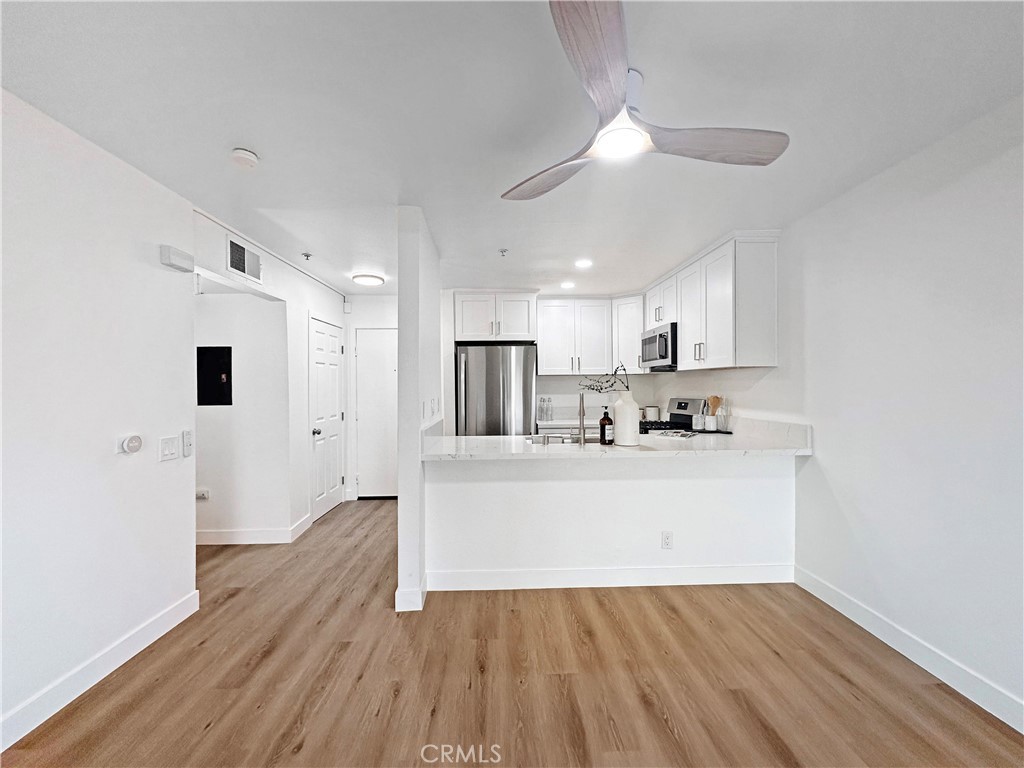 Great opportunity to own and live right in the heart of Santa Ana! Turnkey and upgraded 1 bedroom. 1 bathroom condominium in the desirable Spectrum community. With new designer like finishes throughout this home is just waiting for its new owner. Comes with 2 dedicated parking spaces and is located within a community with many great amenities including a pool, spa, laundry facility and gated access just to name a few. Located in a prime location within walking distance to many great restaurants, shops, entertainment and so much more!!