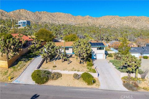 Photo of 54660 Benecia Trail, Yucca Valley, CA 92284 (MLS # JT26003024)