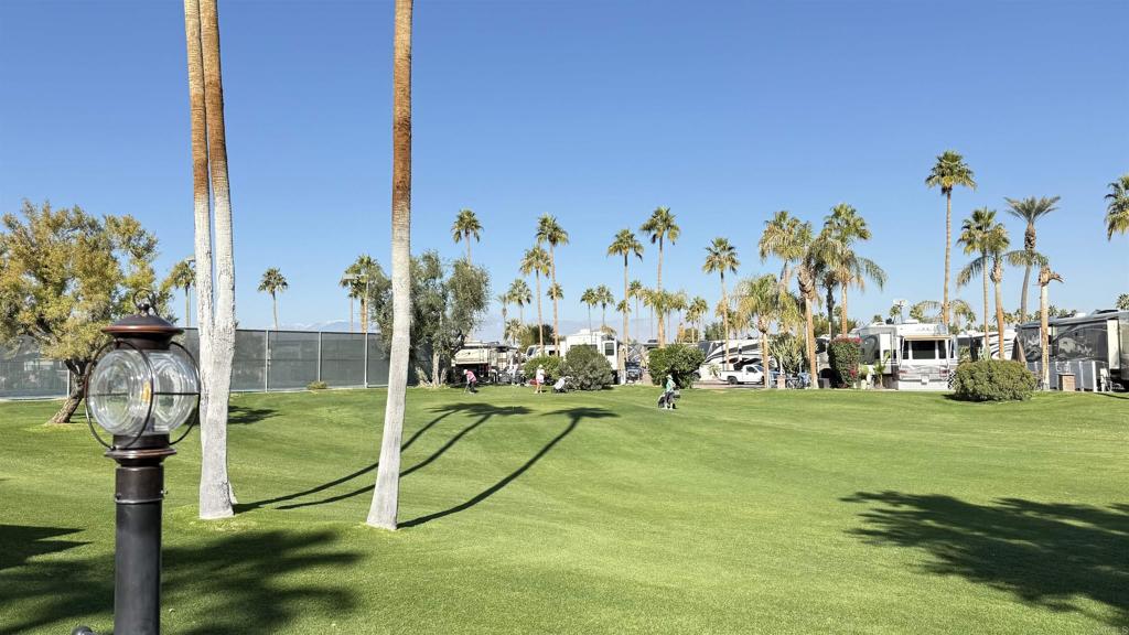 Lot 964 is on the back nine golf course with new added concrete for expanded lot space. Beautiful mountain and green golf views from inside and while on your patio! Available separately from sellers, a gorgeous 2015 Lifestyle fifth wheel needs to be seen! Outdoor Resort Palm Springs (ORPS) is a Guard Gated 5-Star RV Resort Community offering an active and luxurious lifestyle featuring golf (27 holes), tennis, pickleball, swimming and more! Two clubhouses, fitness center, beauty solan, La Roma Restaurant on campus, dog park and more!