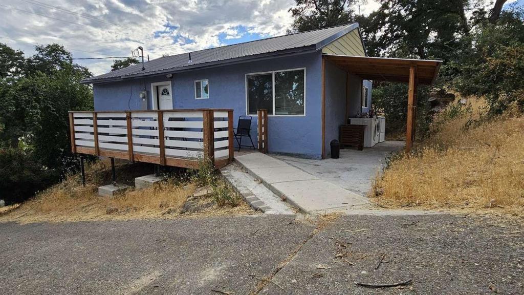 Practically rebuilt house in 2022 with premium finishes including granite countertops in spacious kitchen. Tree-lined street minutes from shopping districts, restaurants, and medical facilities. Adjacent vacant lot at 14740 Uhl Ave, size 5,663 SqFt included - perfect for garden, guest house, or investment. Scenic Views: Enjoy beautiful vistas from your oversized private lot. Modern open-concept layout. High-end energy efficient systems. Designer lighting throughout Ample natural light from large new windows. Situated in Clearlake's most sought-after area, this property offers: Walking distance to essential services. Quick access to medical facilities including existing and upcoming providers. Easy access to Clear Lake recreational activities.This meticulously rebuilt home combines modern luxury with strategic location advantages, offering both immediate comfort and long-term investment potential. Occupied by nice cooperative tenants who stay on a month-to-month agreement. A perfect deal for first-time buyers and investors. Shops and restaurants are within walking distance. Close to the hospital, public transportation, and local college. Fast and reliable Internet connection available.