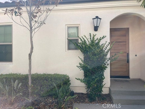Photo of 111 Holly SPGS, Irvine, CA 92618 (MLS # OC26140851)
