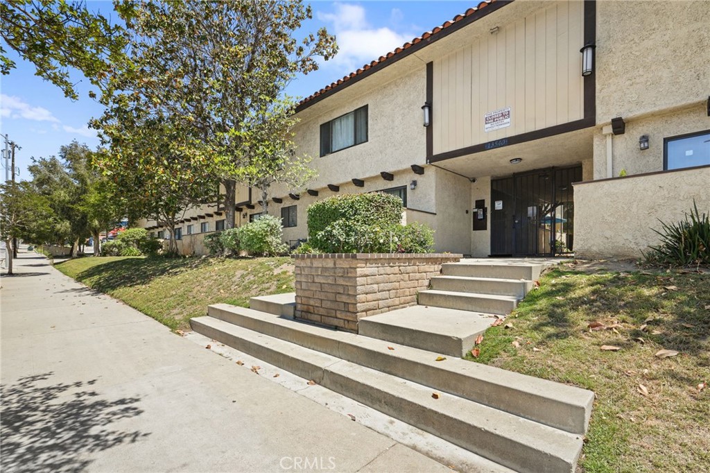 Charming Two Bedroom Townhome in Prime Sylmar Location. Welcome to 13540 Hubbard Street, Unit 21. Well maintained and updated 2 bedroom, 1.5 bath townhome offering comfort, convenience, and modern touches throughout. This inviting home features beautiful wood floors, stylish tile, and cozy upstairs carpeting. The kitchen is a standout, boasting quartz countertops and a clean, modern look. The remodeled bathrooms also feature matching quartz finishes, bringing a consistent and updated feel throughout the home. A newer water heater and a brand-new thermostat adds comfort and efficiency. Washer and dryer hookups are conveniently located in the dining area just off the kitchen. Carport parking, and the community is ideally situated next to the 210 freeway and directly across from a shopping center, making commuting and errands a breeze.