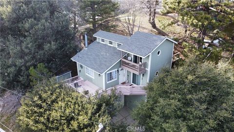Photo of 455 Delle Dr, Crestline, CA 92325 (MLS # PV26034087)