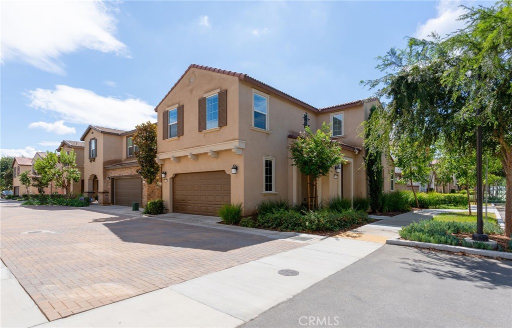 Beautifully upgraded SFR in the heart of Menifee Town Center, featuring parks, pool, clubhouse, walking and biking trails, close to dining and shopping, LOCATION LOCATION LOCATION!! Designer features with LVP floors throughout (NO CARPET) 4 inch base boards, two tone interior paint. The main level offers an open concept kitchen, dining and living room layout. The kitchen features custom (not builder grade) quartz counters, black granite single basin sink, custom subway tile backsplash, upgraded black stainless steel appliances, and matte black cabinet hardware. Powder bath completes the 1st floor. The secondary level offers a spacious primary suite w/ceiling fan, primary en-suite w/dual sinks, upgraded matte black faucets and fixtures, complemented by an oversize walk-in closet. The large secondary bedrooms share a hallway bath with dual sinks and a separate shower/tub area. The laundry room also features a large amount of linen storage. Whole house fan for energy efficient cooling, garage features overhead storage racks, tankless water heater. Backyard patio with turf area, end home so lots of natural light comes in and private yard space, complex has ample parking options. BONUS ** SOLAR HAS BEEN PRE PAID UNTIL 2040** that's right no solar lease payments until 2040!