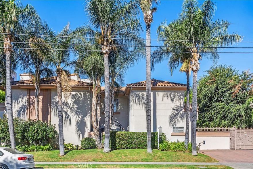 Welcome home to this beautifully designed three-bedroom, three-bath townhome offering just under 1,800 sq ft of bright and spacious living. Designed for everyday comfort and easy living.  This home is filled with elegant details and modern conveniences.

Upstairs, you’ll find all three bedrooms with soaring ceilings, lots of closet space and private balconies. Upstairs second Full bathrooms and dual-sinks.  The primary suite is a true retreat with vaulted ceilings, large walk-in closet, spa-like en-suite bath, and its very own cozy fireplace—perfect for curling up with a good book. 

For added convenience, the upstairs laundry room offers plenty of storage space and keeps everything close to the bedrooms.

The main living areas are equally impressive. A dramatic atrium floods the home with natural light, while the living room boasts a fireplace, wet bar, and direct access to a large private patio. The formal dining area features a coffered ceiling, and the chef’s kitchen offers a granite island, dual ovens, abundant cabinetry, and direct garage access for ease when carrying in packages.

Additional highlights include recessed lighting and a spectacular roof deck patio for enjoying sunny afternoons or evening gatherings. The attached two-car garage with gated driveway entry provides both security and functionality—plus a safe space for kids to bike, skate, or play.

As part of this welcoming community, you’ll enjoy access to a sparkling pool and jacuzzi. With nearby parks, restaurants, shops, places of worship, the Orange Line station, and easy freeway access, this home is perfectly situated for modern living.

You now have a second chance to make this incredible home your own!