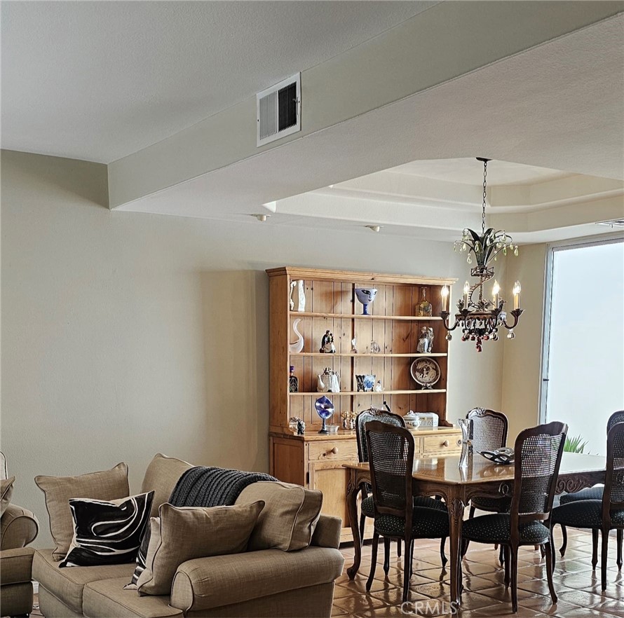 Welcome home to this beautifully designed three-bedroom, three-bath townhome offering just under 1,800 sq ft of bright and spacious living. Designed for everyday comfort and easy living. This home is filled with elegant details and modern conveniences.
Upstairs, you’ll find all three bedrooms with soaring ceilings, lots of closet space and private balconies. Upstairs second Full bathrooms and dual-sinks. The primary suite is a true retreat with vaulted ceilings, large walk-in closet, spa-like en-suite bath, and its very own cozy fireplace—perfect for curling up with a good book.
For added convenience, the upstairs laundry room offers plenty of storage space and keeps everything close to the bedrooms.
The main living areas are equally impressive. A dramatic atrium floods the home with natural light, while the living room boasts a fireplace, wet bar, and direct access to a large private patio. The formal dining area features a coffered ceiling, and the chef’s kitchen offers a granite island, dual ovens, abundant cabinetry, and direct garage access for ease when carrying in packages.
Additional highlights include recessed lighting and a spectacular roof deck patio for enjoying sunny afternoons or evening gatherings. The attached two-car garage with gated driveway entry provides both security and functionality—plus a safe space for kids to bike, skate, or play.
As part of this welcoming community, you’ll enjoy access to a sparkling pool and jacuzzi. With nearby parks, restaurants, shops, places of worship, the Orange Line station, and easy freeway access, this home is perfectly situated for modern living.
This is a rare opportunity—don’t miss your chance to make it yours today!