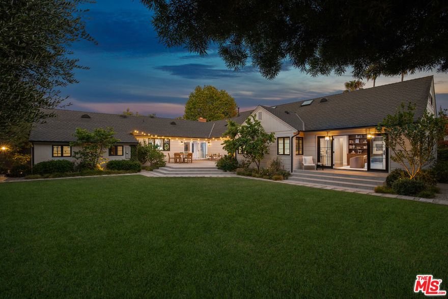 Truly a rare offering..! Coveted and highly sought after Huntington Palisades, recently and meticulously fully renovated 3,445 square foot single-level ranch-style home set on a sprawling and close to 14,000 square foot expansive corner lot. Luxurious Southern California coastal indoor-outdoor living, high-end designer finishes boasting modern amenities; four generously sized bedrooms, four bathrooms and a very large den/office that is recorded as the fifth bedroom. Hardwood oak floors throughout, Marvin windows, and strategically placed skylights, all working together to create light-filled open and inviting living spaces. The fully outfitted chef's kitchen is a culinary dream featuring stunning honed marble countertops, a large center island, custom cabinetry/hardware, Miele dishwasher, sixty-inch full-sized side by side paneled Sub-Zero refrigerator/freezer, and a sixty-inch Wolf range with two full sized Wolf ovens, griddle and six burners.Ideal for entertaining and the Palisades lifestyle with a seamless indoor-outdoor flow, the property offers an expansive back patio, ideal for dining al fresco or hosting large-scale gatherings while overlooking a vast grassy lushly landscaped secluded backyard that is swimming pool and spa ready. Also enjoy olive, fig, lemon, lime, and mandarin trees, plus a separate yard which hosts a versatile large sports court, perfect for basketball, pickleball and other activities.The primary suite is a serene escape, featuring custom solid wood built-ins, French doors opening to another patio adjacent to the backyard, and an elegant ensuite spa-like bathroom showcasing a freestanding soaking tub, and marble floors, countertops, and oversized shower. The guest bedrooms feature oversized closets, large windows, and custom solid wood built-ins. The powder room boasts a custom solid wood floating vanity and sleek quartz countertop. A spacious living room centered around a cozy gas fireplace and adjacent formal dining room both featuring large windows looking out to the manicured front landscaping. The large two-car garage and full-sized driveway provide convenient off-street parking.Pacific Palisadesis acozybeach town, and 14903 Pampas Ricas is situated in one of the most prestigious neighborhoods west of the 405 freeway, just steps to the all-new Caruso PalisadesVillage, which offers high-end boutique shopping, movie-theater, artisan coffee/ice cream shops and award-winning fine dining and restaurants. Also nearby is the Palisades Recreation Center, Park, beach, bike path and hiking trails. Some nearby schools are Palisades Charter High School, Palisades Charter Elementary School, Village School and Seven Arrows, just to name a few. Pacific Palisades is one of the last coastal neighborhoods with a true small beach town feel.