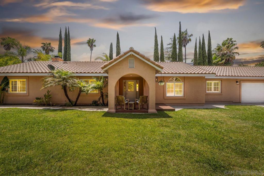 Welcome to your private oasis in the heart of Bonsall, California—one of North County’s most serene and desirable communities. Perched above the treetops with stunning views of the soon-to-be-completed Bonsall Park, this recently remodeled residence blends modern luxury with a peaceful setting - with NO HOA. The home’s inviting layout showcases high-end finishes and top-of-the-line appliances throughout. Enjoy cozy evenings by the fireplaces in both the living room and the primary suite, or entertain effortlessly with a solar-heated pool, expansive patio, and newly fenced oversized yard designed for privacy and gatherings. A separate outdoor BBQ island with refrigeration and a dedicated seating area among the trees creates the perfect backdrop for memorable events. Additional highlights include a brand-new furnace and central A/C system, a large 3-car garage, and plenty of driveway parking. Located just minutes from the quaint town center with its incredible restaurants, movie theater, and everyday conveniences, plus access to one of the county’s highest-rated school districts.