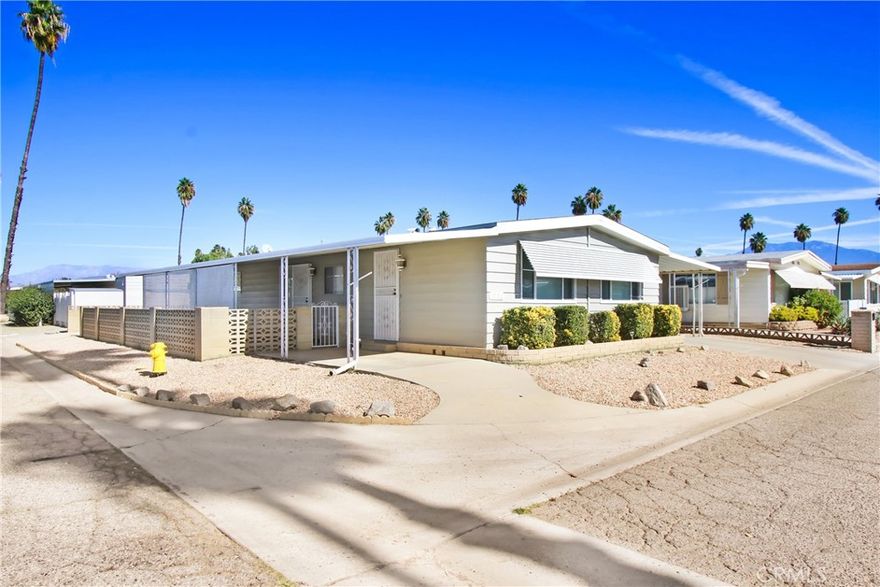 Welcome to 1760 Santo Domingo Way, a beautifully updated 2-bedroom, 2-bath home located in the highly desirable Sierra Dawn Estates 55+ community in Hemet. This spacious 1,344 sq. ft. home features new flooring, fresh interior paint, and a bright, open layout. The home offers a large living area, in-unit laundry, central A/C and heating system, and a covered carport for convenient parking. Situated on a corner lot, the property provides extra privacy and plenty of natural light.
Residents of Sierra Dawn Estates enjoy access to an abundance of amenities, including clubhouses, pools, spas, and a variety of community events and activities designed for active adults. This well-maintained neighborhood offers a welcoming and vibrant environment close to shopping, dining, and medical facilities