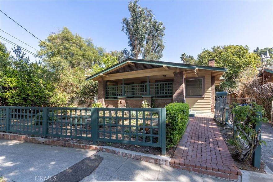 This property holds incredible potential, offering an exceptional opportunity to create something truly special while also presenting a potential development opportunity with two separate LARD2 lots totalling 11,808 sq/ft. Live the idyllic Hollywood Hills lifestyle of your dreams near Lake Hollywood and the iconic Hollywood Bowl. Currently, the property consists of two separate homes, a 3+2 craftsman style home built in 1914 and a cozy 1+1 cottage, a detached two-car garage, and a large backyard and additional expansive lot will allow your imagination to take hold. The charming covered porch evokes a sense of days gone by, offering a warm and inviting welcome to all who enter. Inside, the family and dining rooms are flooded with natural light, showcasing beautiful original architectural details. Features such as a classic brick wood-burning fireplace, oversized windows, and exposed wood beams add character. An adjoining 4,316sq/ft lot is included in the sale; this undeveloped lot is a hidden gem, brimming with endless potential. With plenty of space to grow, it promises a lush haven where a variety of fruits and vegetables can flourish. Some upgrades include copper plumbing, updated electrical panels, a new main sewer line, newer roofs and a whole home fan. This property invites your imagination to run wild, offering the perfect canvas to bring your vision to life in one of Hollywood’s most coveted and scenic neighborhoods; the possibilities are truly limitless.
