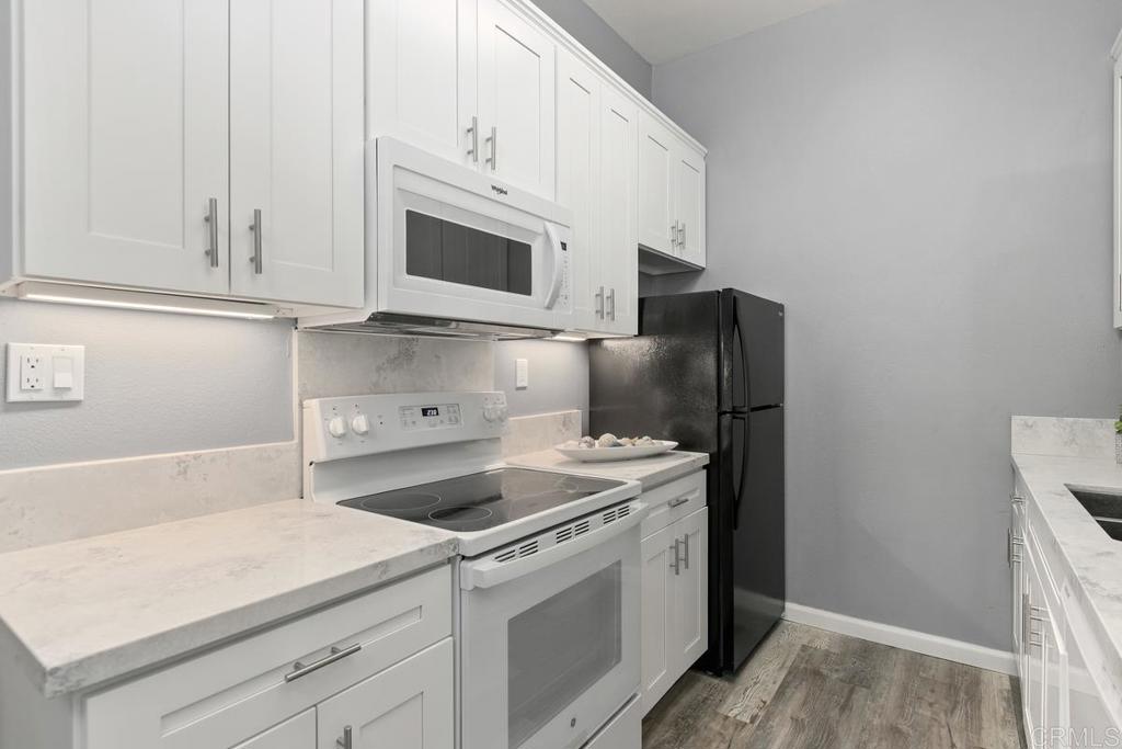 Seller will entertain offers between $459,000 and $499,000! REMODELED 1BD/1BA single level condo in the gated community of The Pines of La Jolla with a VIEW balcony. Highly desirable location in the complex - just one floor above the garage. Kitchen features newer white cabinetry, gorgeous quartz countertops, stainless steel sink and newer appliances. The bathroom was recently updated with a new vanity, custom tile and plumbing fixtures. Additional highlights include newer paint and baseboards, luxury vinyl flooring throughout and an elevator in the building allowing for easy access to the unit. The Pines of La Jolla features a pool and spa in a lovely garden setting. Excellent location within close proximity to UCSD, Doyle Park, beaches, and Westfield UTC for upscale shopping, dining and entertainment.