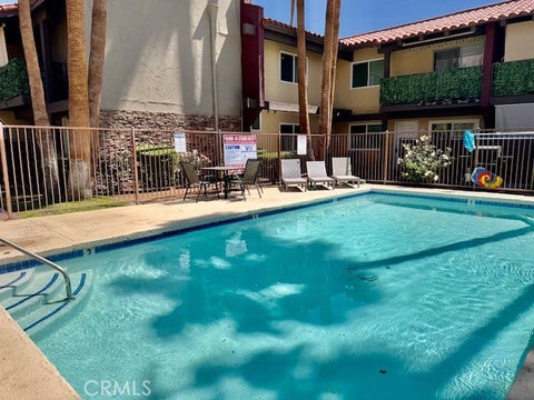 Photo of 51020 Eisenhower DR #28, La Quinta, CA 92253 (MLS # NP26204803)