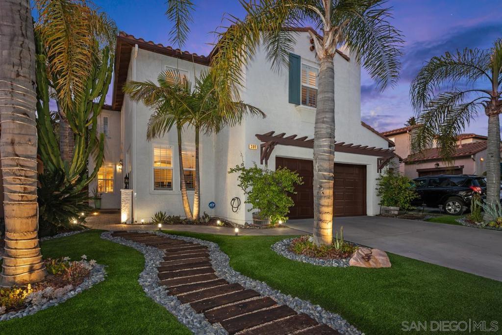 Fantastic home located in the desirable gated neighborhood of Buenavida in San Marcos. Fully paid/owned 8.5 kWh solar system and EV hookup, ideal for energy-conscious living! Inside, you'll find gorgeous upgrades, a versatile floorplan, including an optional bedroom downstairs, three bedrooms upstairs, plus an extra bonus room off the primary suite. The home features luxury vinyl plank flooring, new carpet on stairs and in all bedrooms, crown molding, and elegant white plantation shutters. For year-round comfort, there's central heating and A/C, a cozy fireplace, along with a dual-zone BOSE surround sound system in the family room and on the outdoor patio. The kitchen is a chef's dream, equipped with a kitchen island, granite countertops, stainless steel appliances, a new LG whisper-quiet dishwasher, and a reverse osmosis water filtration system. The downstairs space can serve as a bedroom or office. Upstairs, the primary bedroom boasts a private bonus room with a sliding pocket door, ceiling fan, and canned lighting, and register, perfect for a home office, nursery, or relaxation area. French doors lead to a rebuilt balcony deck with new wood and paint. The professionally designed backyard is an entertainer's paradise, featuring a full outdoor kitchen with granite countertops, a gas grill, dual-zone burner, sink, exterior fridge, aluminum cabinets, bar seating for four, electrical outlets with USB ports, and dedicated lighting, all under a stunning 3-layer pergola. See supp. The landscaping includes pavers, turf, lava and river rock, low-voltage lighting, a drip irrigation system, and drought-tolerant plants. The front yard is equally impressive with custom turf, a curved paver walkway, a railroad tie path, river rock accents, and drought-friendly planting. Exterior elements, including shutters, trim, and the backyard balcony, have been recently painted for a fresh look. This home also features a fully paid/owned 8.5 kWh solar system, originally installed in 2020 and expanded in 2023, making it ideal for energy-conscious living. The garage is EV-ready with a 50 AMP NEMA 15-50 outlet (250V), custom built-in cabinets, ceiling storage racks, and a freshly painted garage door. You'll enjoy the best of North County living, with low HOA and Mello-Roos fees, top-rated school districts, near Cal State San Marcos, Palomar College, The San Marcos Creek, Discovery Lake, and close proximity to beautiful beaches, shopping, and dining.