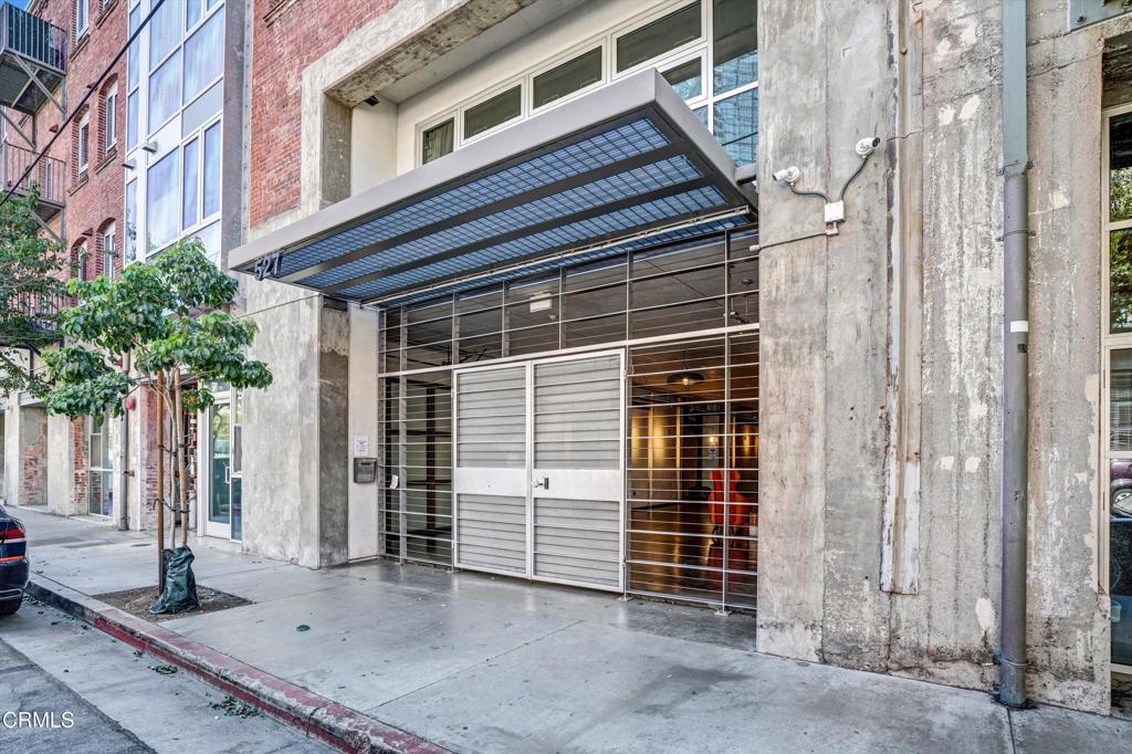 Welcome to Barker Block Unit 111, a unique townhouse-style end unit nestled in the heart of Los Angeles. This exceptional residence offers a rare private patio, perfect for enjoying the vibrant city atmosphere in your own quiet sanctuary. With 1,380 square feet of living space, this unfurnished home features two spacious bedrooms and one and a half bathrooms, blending comfort with modern urban living.Step inside to discover a smartly designed layout with sleek concrete floors and air conditioning, keeping the space cool and stylish. The open living area flows seamlessly into the dining space, creating a welcoming environment for both relaxation and entertaining. Your own private storage unit is deeded with the property, providing ample space for personal belongings. Upstairs is a soft-loft format ideal for a couple or a work from home need or that roommate if you must. Residents enjoy exclusive access to an array of top-tier amenities. Take a dip in the sparkling pool, unwind in the hot tub, or host a barbecue gathering on the common roof deck. Stay active in the well-equipped gym or explore the bike room. Convenience is key with an in-unit washer and dryer, laundry facilities in the building, and assigned parking in the garage.The building also features a full-time concierge, security gate, and security system, offering peace of mind. Pet-friendly policies ensure that your furry friends are welcome too. Embrace the sophisticated lifestyle at 527 Molino Street, where comfort meets elegance. Walking distance from dining like Zinc Cafe, Girl and the Goat, Bevel and more.