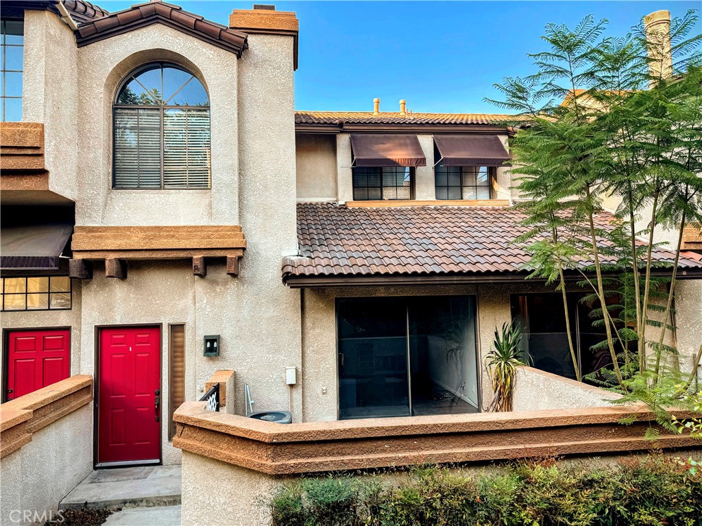 A highly decorative opportunity to further unveil a lovely two-story, 2 bedroom and 3 bath home located in the beautiful and well sought out Hidden Valley gated community. Take complete and utter delight with the laminate wood flooring present throughout the course of the home. It will boast with a nice sizable bedroom. The primary bedroom has a full bath. It beckons a formal living room with a warm fireplace, a formal dining room, and a private front yard with a sliding door covered by wood shutters for complete interior privacy. Not to mention that there is a nice patio adjacent to the kitchen. Marvel at the distinct decorative loft space appeal with a high ceiling bookshelf enriching that tranquil space. The main floor will also have direct access to the 2 car garage where you will conveniently find the washer and dryer hookup present. This location has impressive convenience. It is within walking distance to Diamond Ranch High School and has seamlessly easy access to the 60/71 freeway. This rental will not be on the market for long! DO NOT MISS OUT ON THIS PICTURE PERFECT OPPORTUNITY.