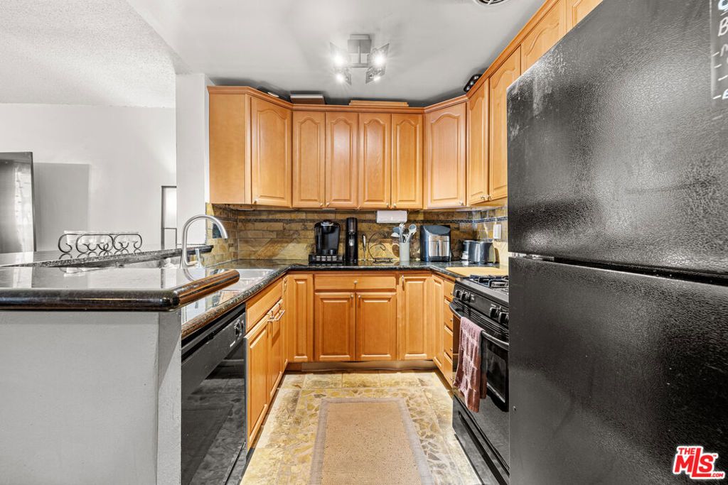 Photo of 6435 Green Valley Circle #214, Culver City, CA 90230 (MLS # 25599117)