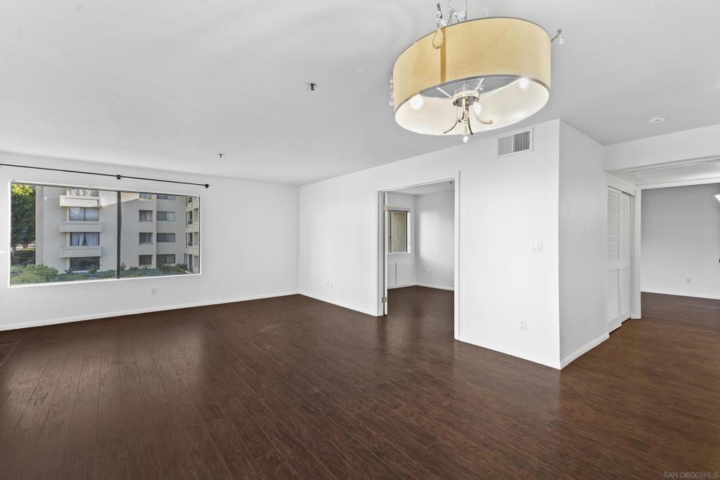 Available Now! This uniquely positioned corner unit gets lots of natural light and a view of the water feature! This spacious and freshly painted condominium with central a/c has 2 full baths, a gas fireplace and a great front facing balcony with an extra storage closet. Primary bedroom has an ensuite bath and a walk in closet! El Dorado Greens is one of the only complexes in the area that provide a wide selection of amenities for no extra charge, including internet, cable, water, sewer, and trash! A beautiful community pool, jacuzzi, and tennis courts are just steps away. One reserved underground parking is included and another space for uncovered parking is permitted. Street parking is also nearby and free of charge.