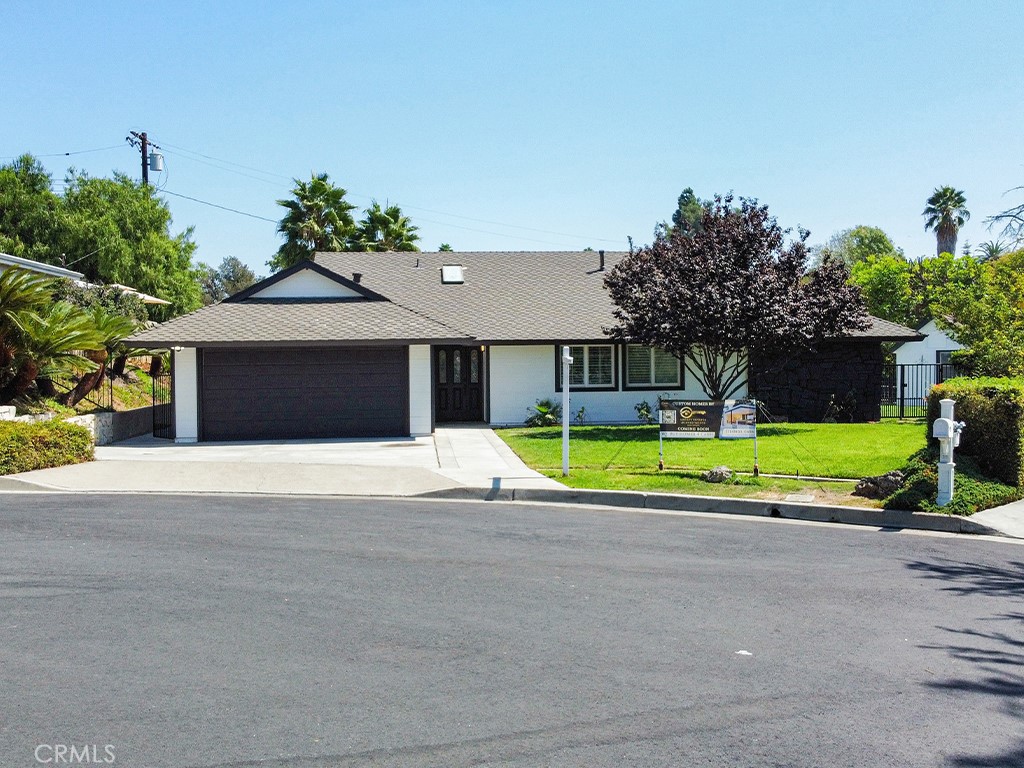 Legacy Estates proudly presents a fully renovated gem in the prestigious Sunny Hills neighborhood. Tucked away on a quiet, tree-lined cul-de-sac, this stunning 5 bedroom, 2 bathroom home offers over 2,400 sq. ft. of beautifully reimagined living space.
Step inside to an open floor plan designed for today’s lifestyle. The custom kitchen features a striking oversized island, modern finishes, and seamless flow into the living and dining areas. Both bathrooms have been tastefully renovated with designer touches, while spacious bedrooms provide flexibility for family, guests, or a home office.
Enjoy indoor-outdoor living with a large backyard deck, perfect for entertaining. A custom-built shed adds extra storage, while the 2-car garage showcases new epoxy flooring and an impressive wash room.
This home truly has it all — style, function, and location. A rare opportunity in Sunny Hills that is a must-see and will not last long!