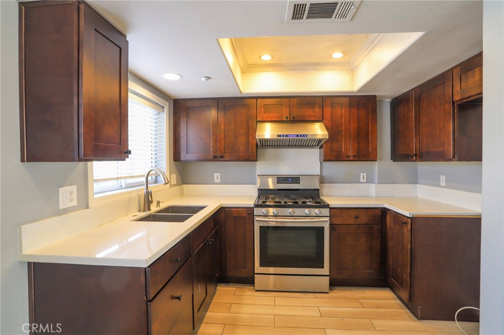 An opportunity to live in the heart of Little Saigon (Hazard & Brookhurst). A beautiful home built in 2006, Townhome style with Spacious Livingroom, Crown Moulding, Travertine tile fireplace, Custom Built-in Wet Bar. Dual pane windows, Baseboard, Recessed Lighting. Gourmet kitchen with granite countertop, Stainless steel Appliances, Beautiful flooring and Ceiling Fans. Master bedroom has private bath and walk in closet. Central Heat and Air Conditioning. Direct access to garage and Washer and Dryer hook up. Close to shopping center, restaurants and freeways.