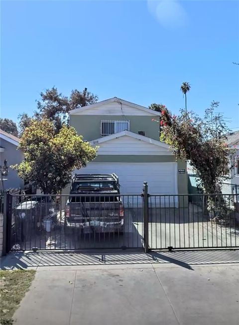 Photo of 2110 E 113th St, Los Angeles, CA 90059 (MLS # DW25242772)