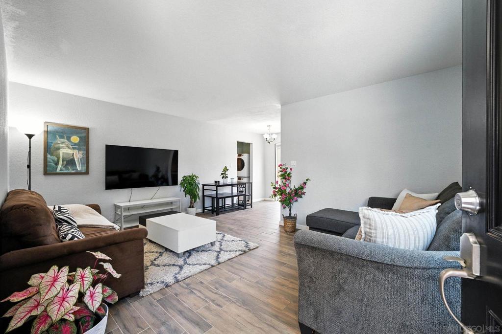 This beautifully updated home with a huge private patio is the best priced 1 bedroom condo in Clairemont Mesa. Step inside this turnkey gem that has brand new windows, gorgeous flooring, and a recently updated kitchen with granite countertops and sleek cabinetry. Your oversized bedroom has a wall-to-wall closet, and this is a rare condo that has in-unit laundry. Also enjoy the convenience of an assigned parking space inside the gated section of the complex. This complex is VA approved and may be able to get FHA spot approval. Love coffee, great food, or the beach? This is your dream location. Forum Coffee House is 3 minutes away, and you're steps from the Balboa & Genesee shopping centers filled with eateries, boba spots, and convenience stores. Plus, you're next door to Convoy, home to some of San Diego's best restaurants. All of this, less than 15 minutes from the beach and centrally located in one of San Diego's most connected neighborhoods. This home truly has it all -- spacious, bright, beautiful, location, lifestyle, and value!