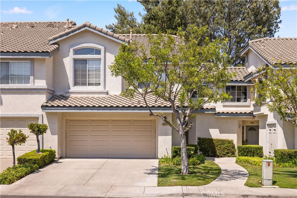 Welcome to 8035 E Treeview Ct – Comfort & Convenience in Anaheim Hills. Located in the prestigious gated community of Viewpointe North, this beautifully maintained 3-bedroom, 2.5-bath condo offers a perfect balance of space, function, and lifestyle. The main level features a spacious living room with a cozy fireplace, formal dining area, a bright breakfast nook, and a large kitchen with elegant white shaker cabinets and brand-new quartz countertops—ideal for both cooking and entertaining. Upstairs, you’ll find a peaceful primary suite with en-suite bath, two additional bedrooms, a full bath, and the convenience of an upstairs laundry room. Plantation shutters, vaulted ceilings, and abundant natural light enhance the home’s appeal. A rare full-size driveway complements the attached 2-car garage—offering parking for up to 4 vehicles. Enjoy the outdoors on your private patio or explore the community’s resort-style amenities, including 2 pools, 5 spas, greenbelts, and walking paths. Close to award-winning schools, parks, shopping, and dining, 8035 E Treeview Ct is a true gem in the heart of Anaheim Hills. Schedule your private showing today!