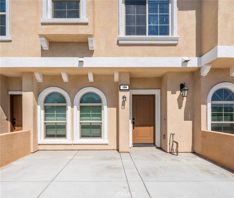 Photo of 15447 Pomona Rincon Road #104, Chino Hills, CA 91709 (MLS # WS26095103)