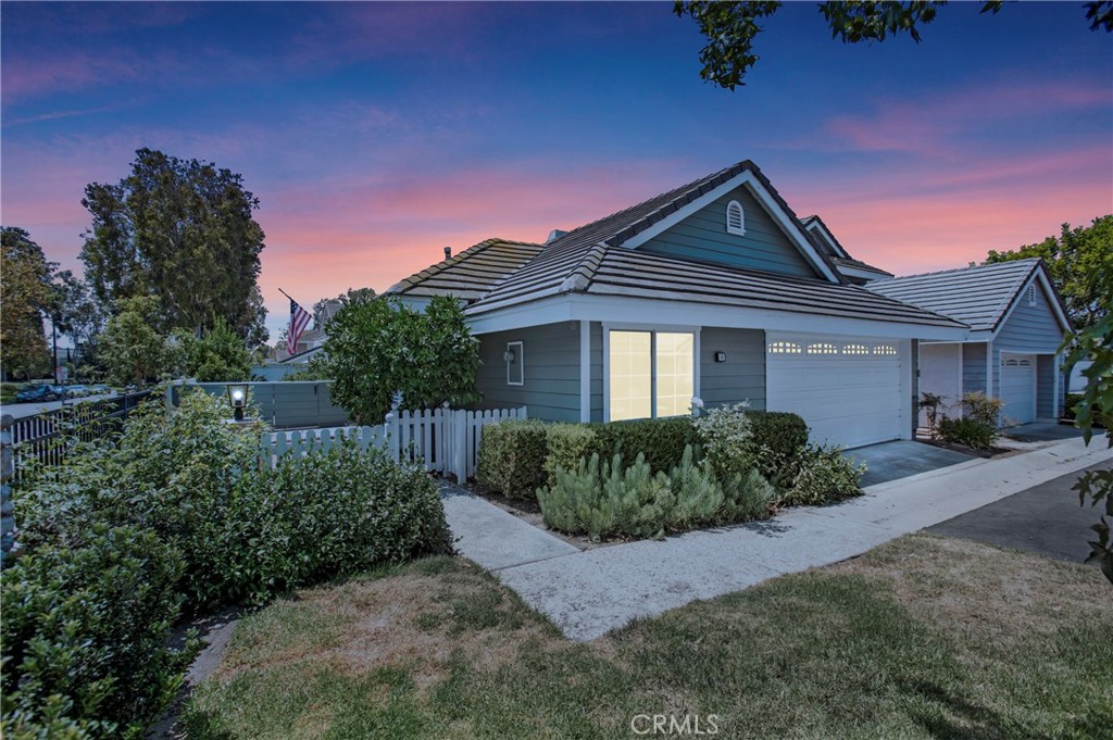 THE Best Home in Irvine under $1.3 Million! Experience the finest of Irvine living in this stunning remodeled Single-Level home, ideally located in the highly sought-after Woodbridge community—adjacent to Woodbridge's lovely South Lake and scenic parks. Nestled on a beautiful lot and showcasing impressive curb appeal, this stunning light-filled 2-bedroom, 2
-bathroom residence also features a versatile den or OPTIONAL 3rd BEDROOM with a closet. Meticulously renovated with timeless sophistication, this home boasts new wide-plank light wood-style flooring, soaring ceilings, and oversized windows that flood the open-concept interior with natural light. The elegantly upgraded kitchen features brand-new stainless-steel appliances, expansive picture windows, and a modern aesthetic perfect for today's lifestyle. The spacious living room with cozy fireplace opens seamlessly to a private, landscaped front yard through glass sliding doors—ideal for indoor-outdoor entertaining. The formal dining area flows effortlessly into the kitchen, offering a harmonious space for gatherings. Luxurious upgrades continue throughout the home, including fully renovated bathrooms with designer fixtures, contemporary tile work, and a beautifully reimagined primary bath with a glass-enclosed walk-in shower. Updated lighting fixtures throughout the interior and exterior add a refined touch. Enjoy tranquil mornings or evening sunsets in your private outdoor retreat, with picturesque lake views framed by mature, tree-lined surroundings that provide beauty and privacy. Residents of Woodbridge enjoy resort-style amenities including two scenic lakes with walking paths, sandy lagoons, multiple pools and spas, tennis courts, parks, and more—all within a welcoming, established community. Walk to award-winning Irvine Unified Blue-Ribbon schools, and enjoy convenient access to world-class shopping, dining, and entertainment. Plus, no Mello-Roos in America’s “Safest City” according to the FBI. Embrace year-round sunshine and the relaxed luxury of a Southern California lifestyle - this is the home you’ve been waiting for! Welcome Home!